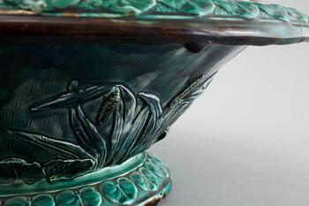 A majolica bowl by Rörstrand, dated 1872.