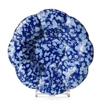 446. A French Nevers 'Bleu Persan' faience buckel platte, circa 1690.