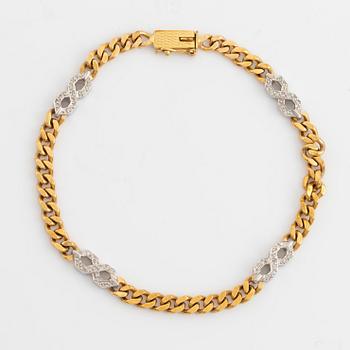 18K gold and small eight cut diamond necklace and bracelet.