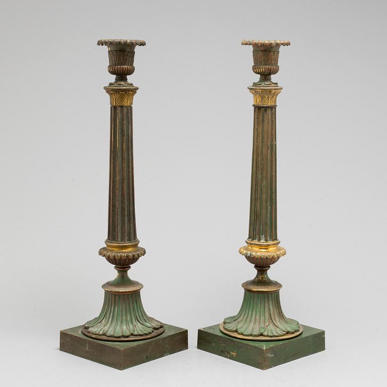 A pair of bronze gustavian candlesticks, late 18th century.