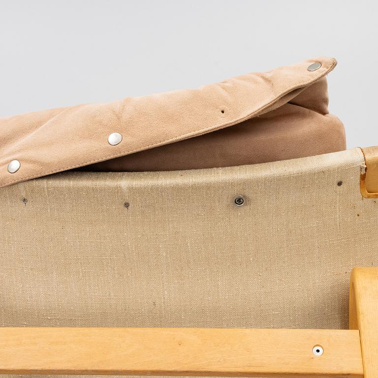 Bruno Mathsson, fåtöljer, ett par, med en fotpall, "Pernilla", DUX.