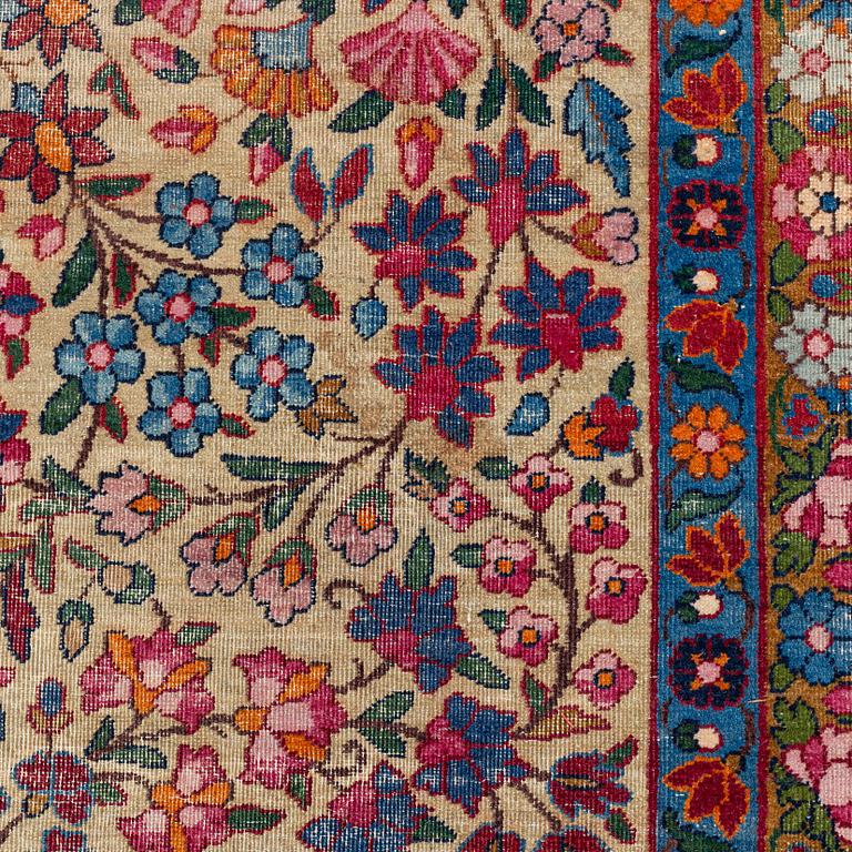 An antique 'Millefleur' Kerman Laver carpet, ca 434 x 321 cm.