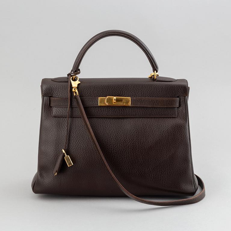 Hermès, a chocolate leather 'Kelly' handbag, 1995.