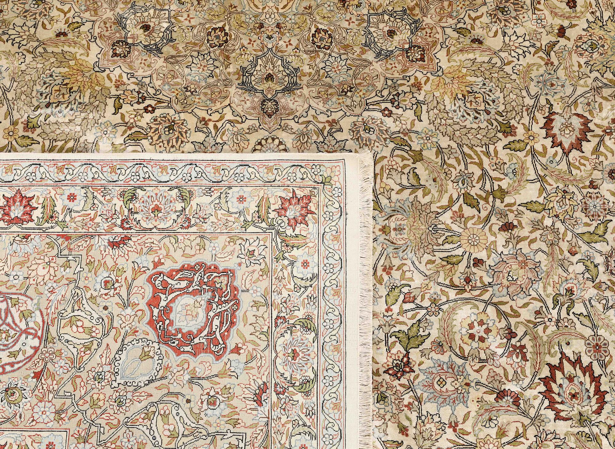 A oriental silk carpet, 350 x 247 cm.