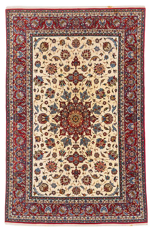 A semi-antique Isfahan rug, c. 225 x 143 cm.