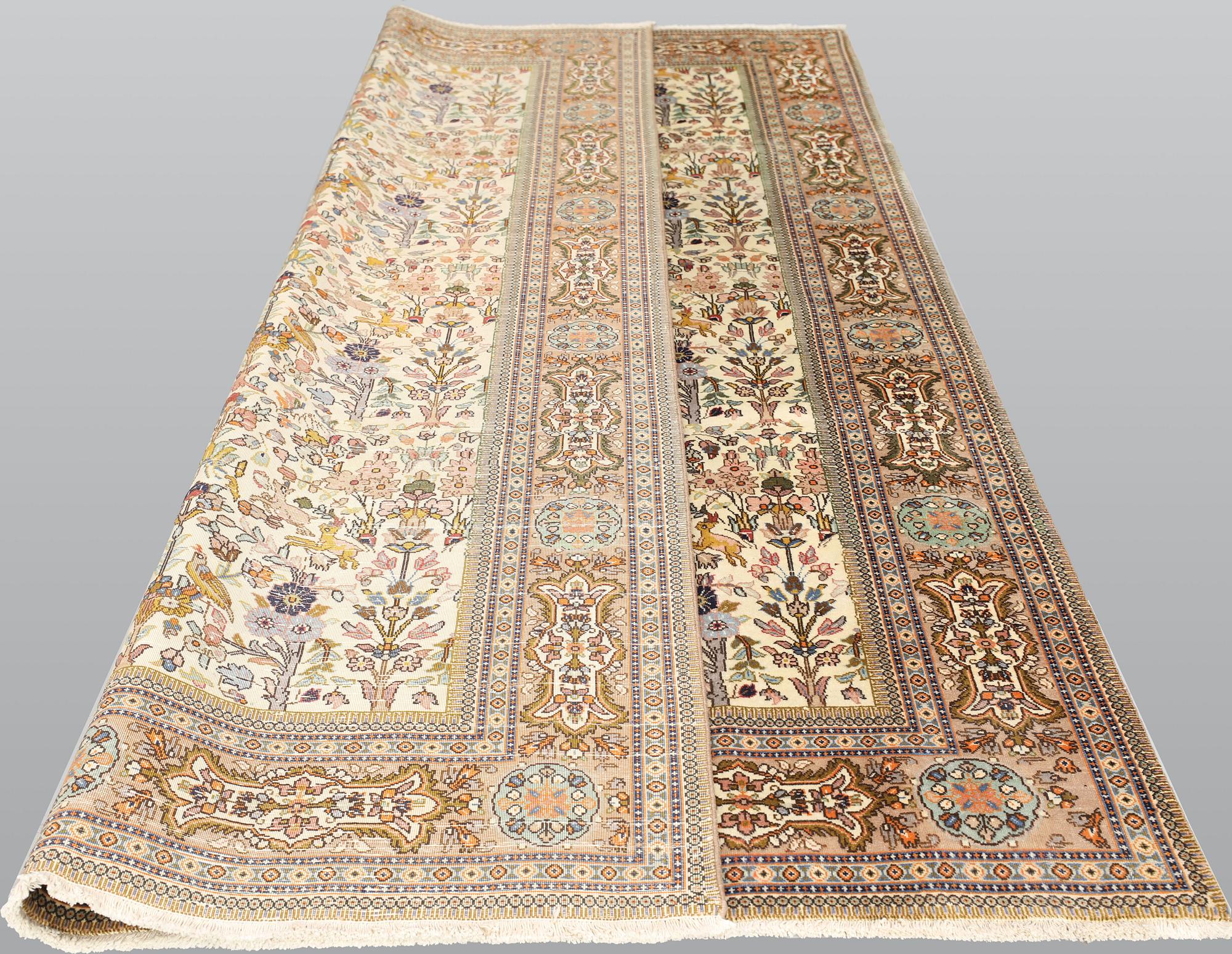 A Täbriz Tabatabai carpet, c.  352 x 240 cm.