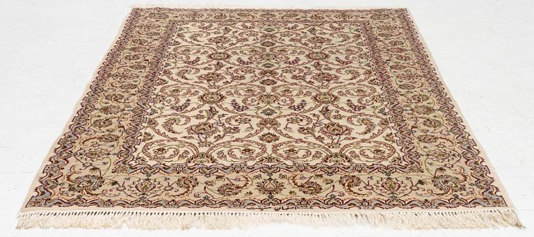An Isfahan part silk rug, c. 161 x 110 cm.