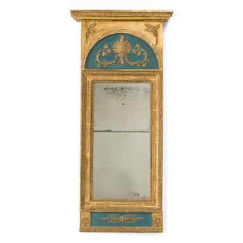 An empire mirror, signed Holm, Stockholm 1834.