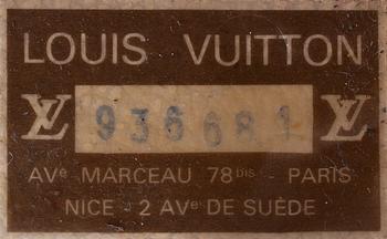 A Louis Vuitton wardrobe trunk.