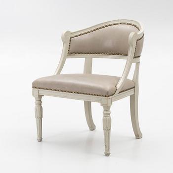 A late Gustavian style armchair, late 20th Century.