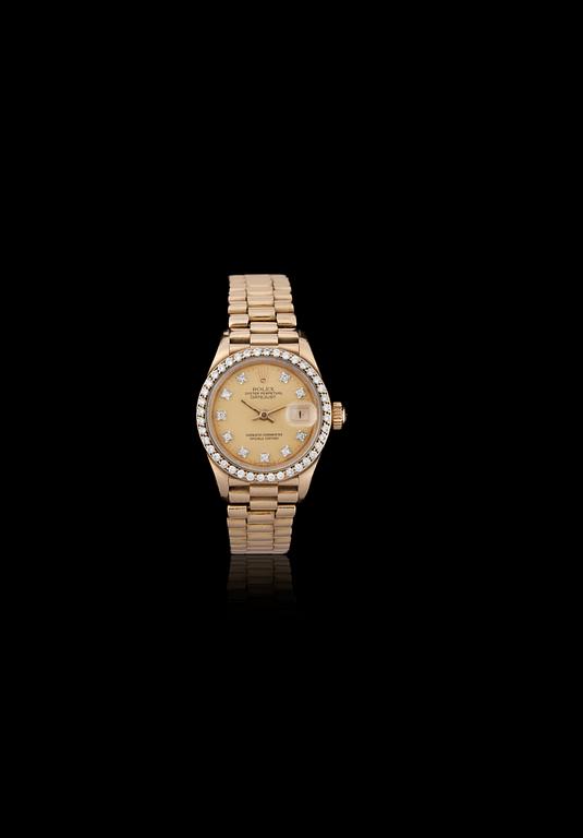 Rolex - Datejust. Automatisk. Guld/guld. Briljantring. 26 mm.