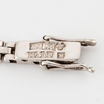 A bracelet 18K white gold with ruby and brilliant-cut diamonds. Malmö 1948.