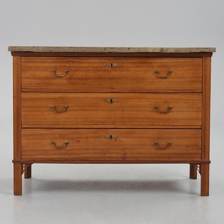 A mahogany-veneered late Gustavian commode by G. Iversson (master in Stockholm 1778-1813).