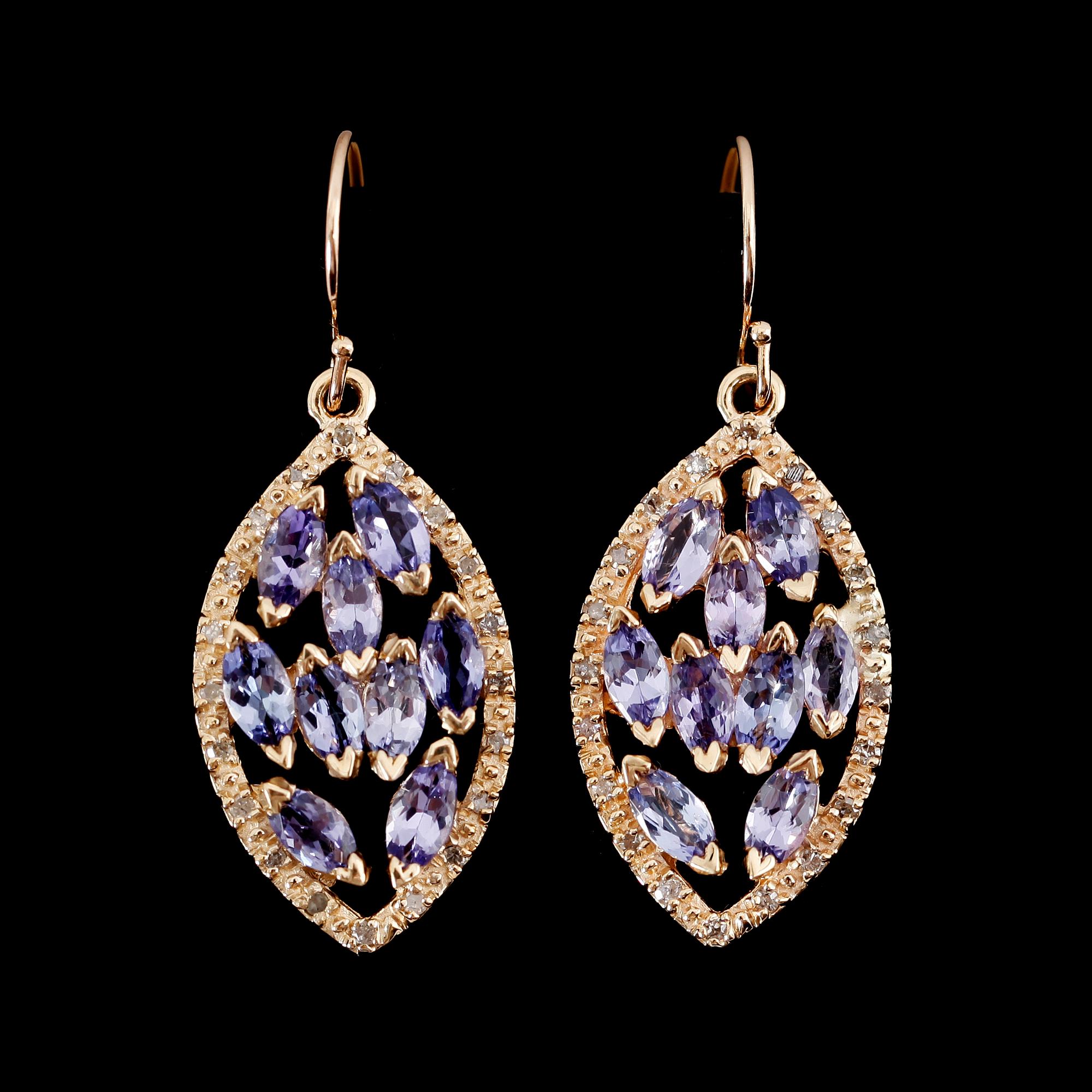 ÖRHÄNGEN, 1 par, 14 k guld, tanzaniter tot ca 2.90 ct, diamanter tot ca 0.40 ct.