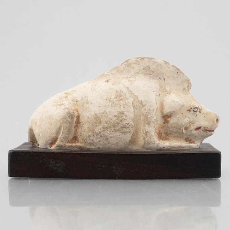 A pottery model of a boar, Tang dynasty (618-907).