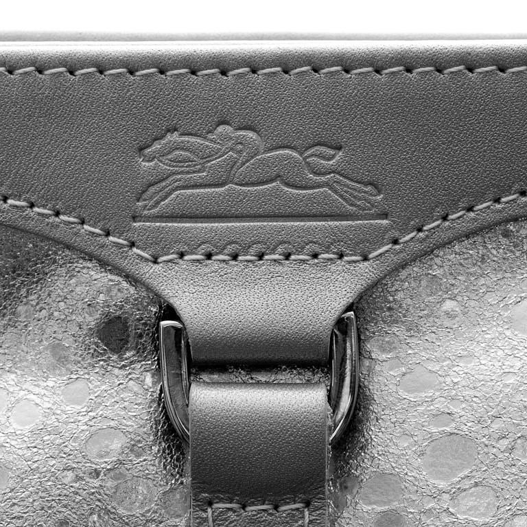 LONGCHAMP, a silver colored leather evening bag / pochette.