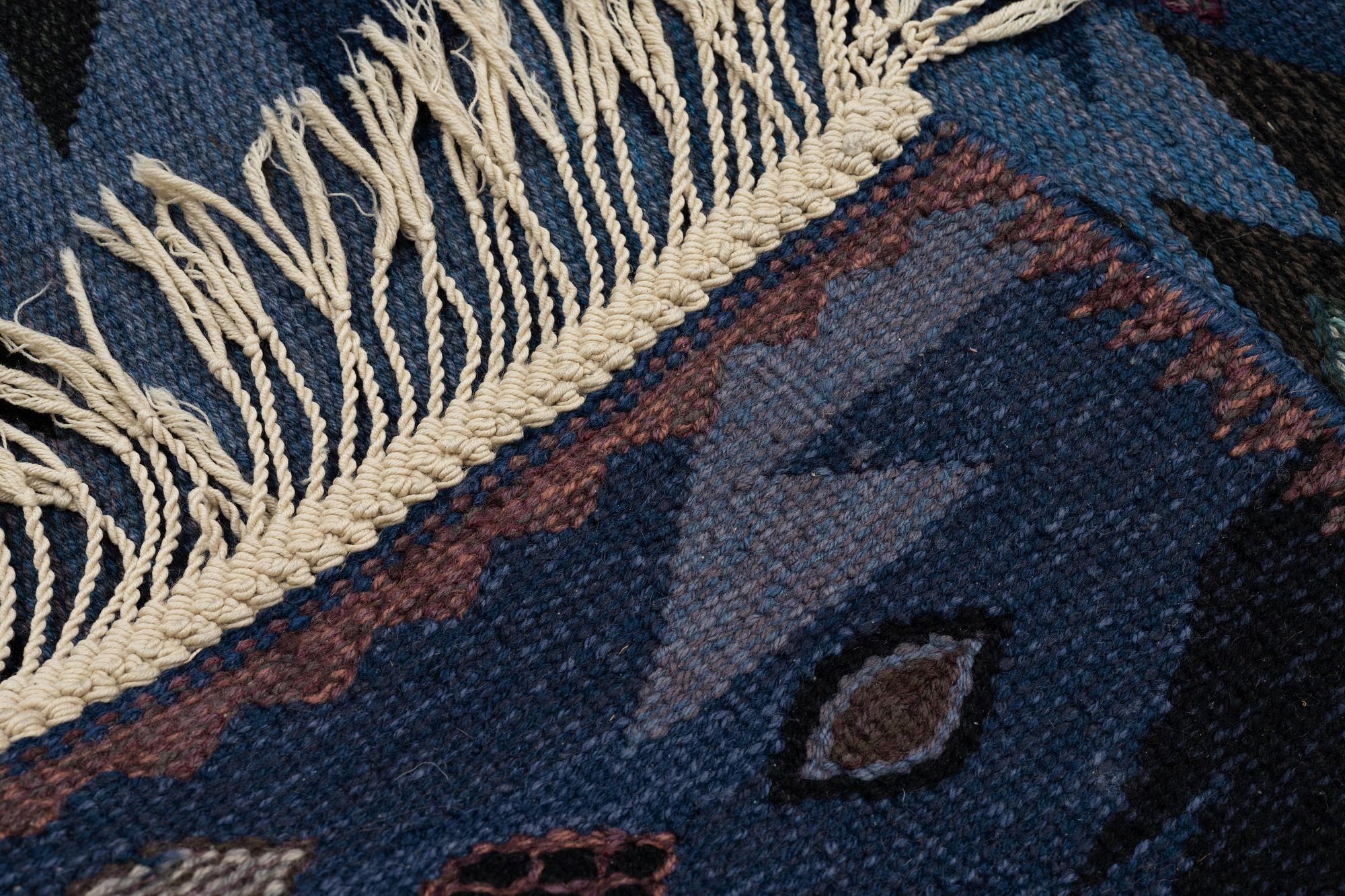 Barbro Nilsson, a carpet, "Tånga blå", flat weave, ca 243,5 x 173 cm, signed AB MMF BN.