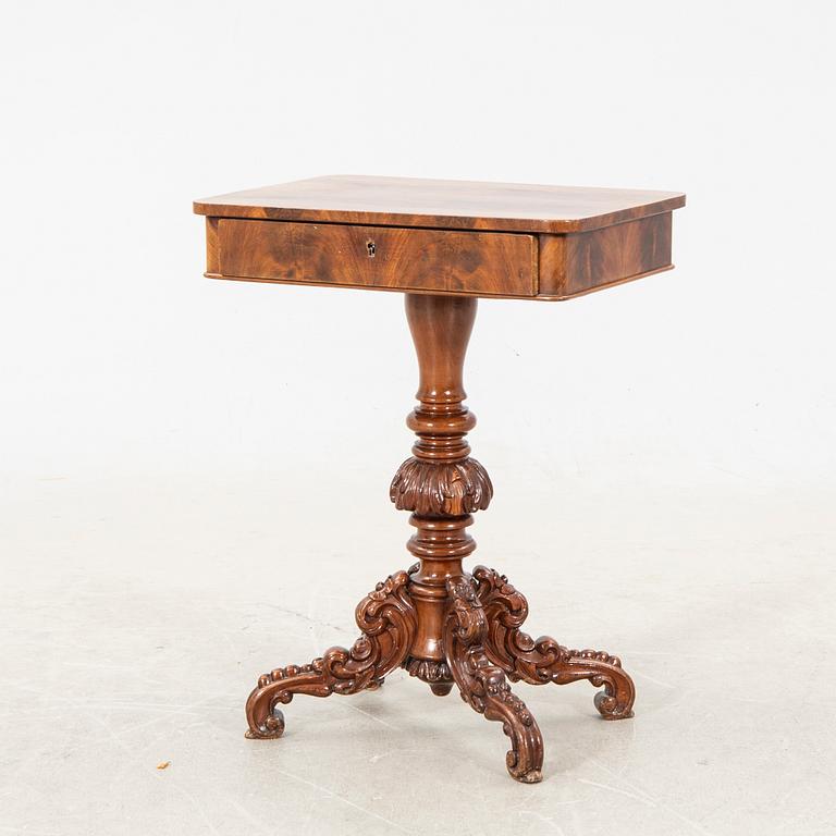 A mid 1800s Neo Rococo sewing table.