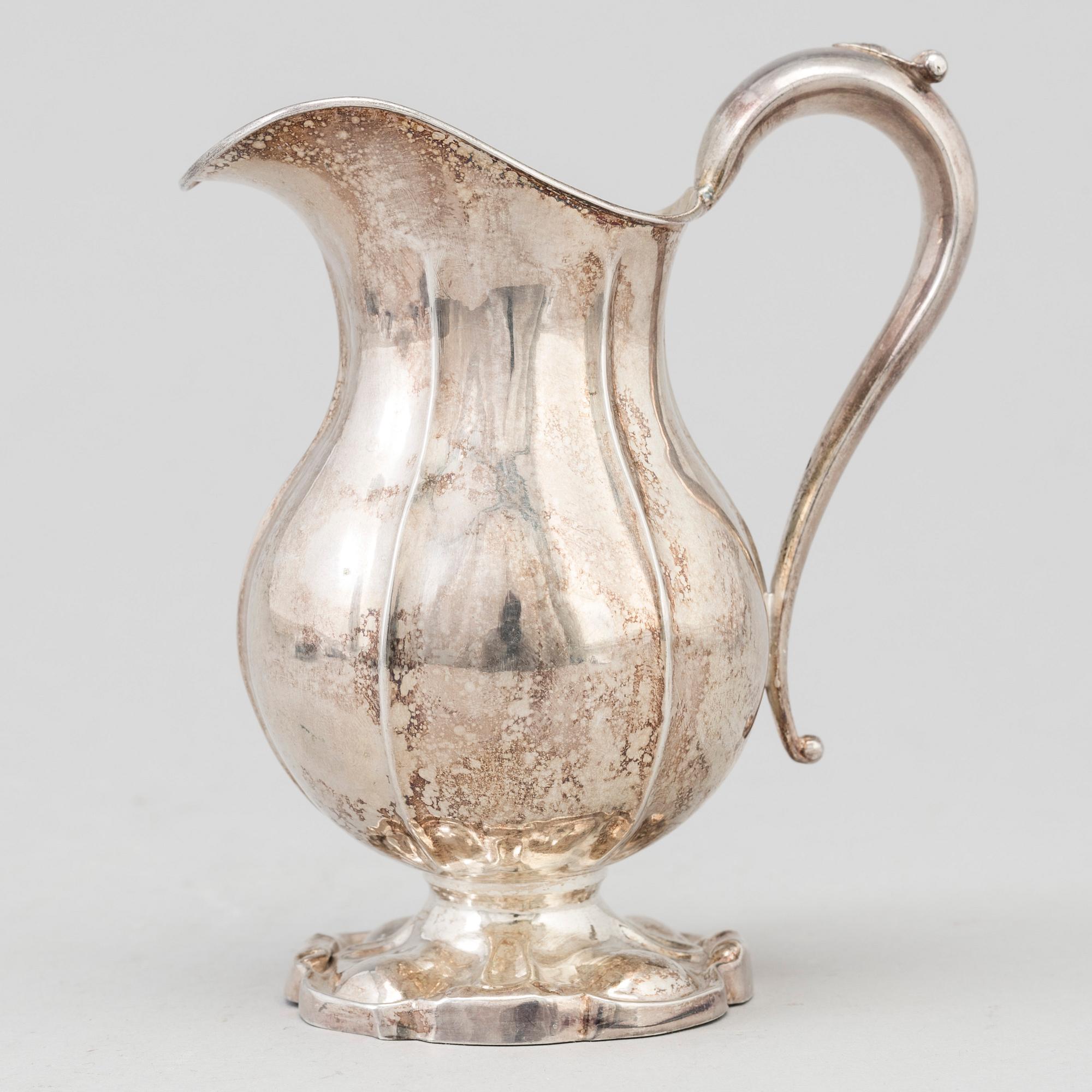 A Swedish SILVER CREAM JUG, 1857, Maker's mark Bror Erik Skogsborg, Eskistuna. Weight ca 135 g.