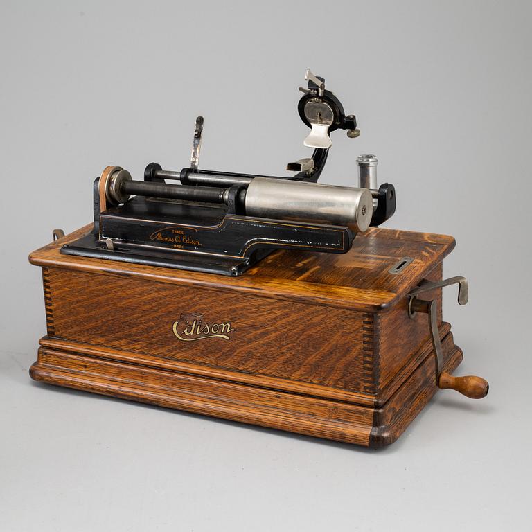 An Edison Phonograph with Cygnet horn and 12 cylinders.