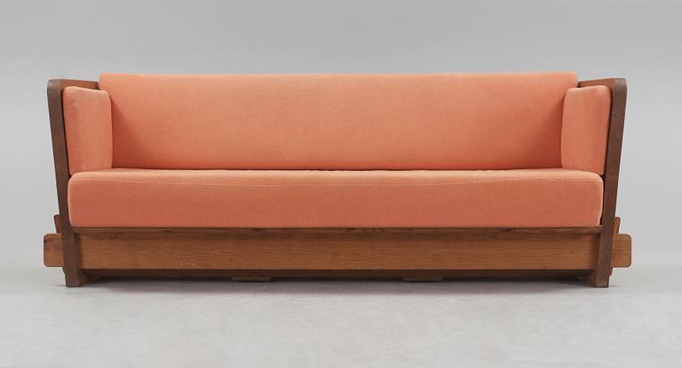 An Axel Einar Hjorth stained pine sofa 'Lovö'. Nordiska Kompaniet Sweden 1930's.