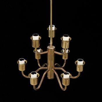 Hans-Agne Jakobsson, a late 20th century brass and glass ceiling lamp for nine lights, Markaryd, Sweden.