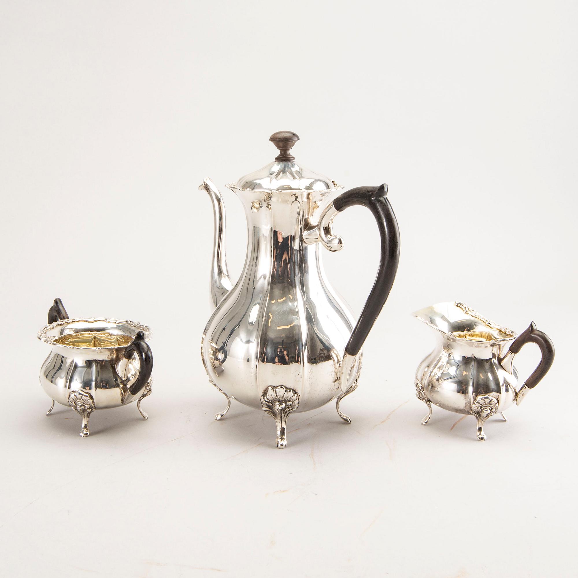 A 20th century German three parts silver tea service with Swedish import stamps.