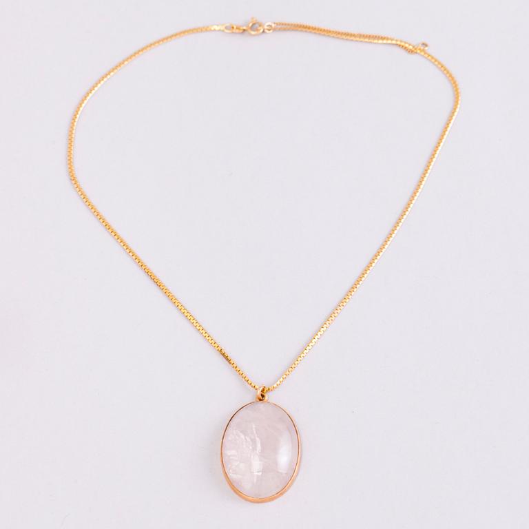 A 1950s three piece jewellery set with 14K gold and rose quartz.