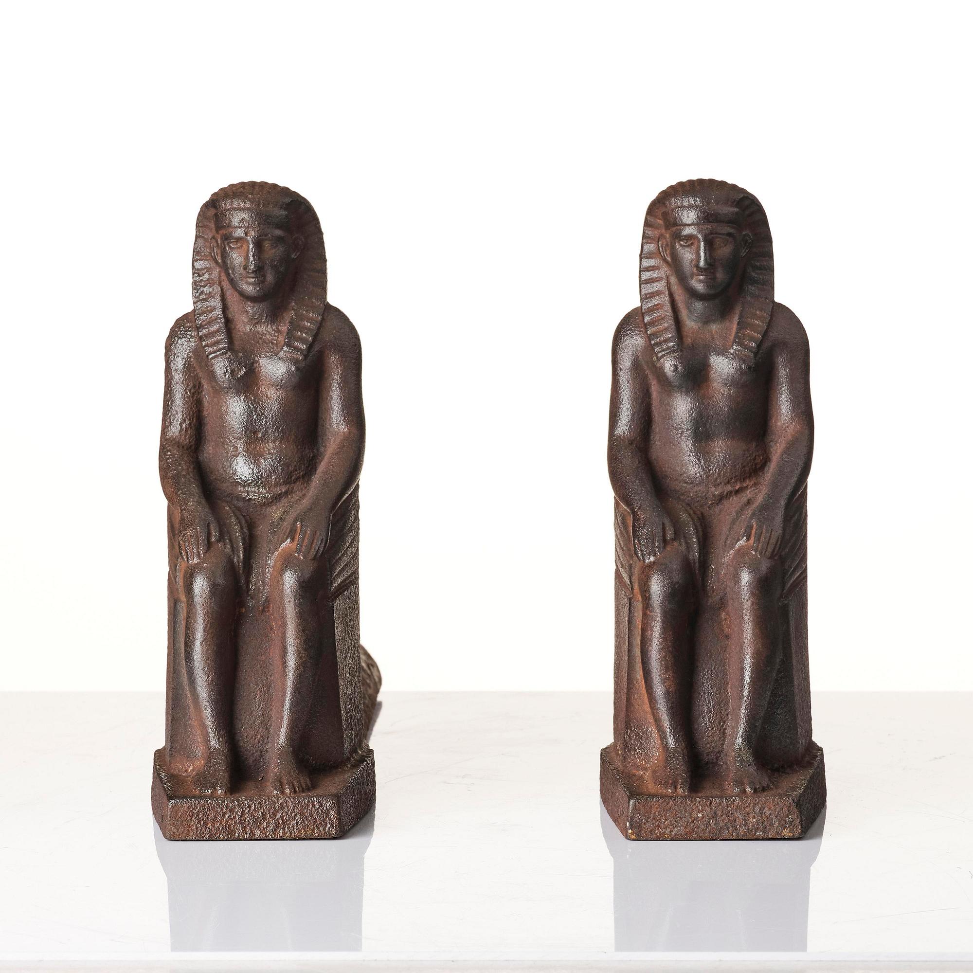 A pair of French Empire cast iron chenets, first part 19th century.