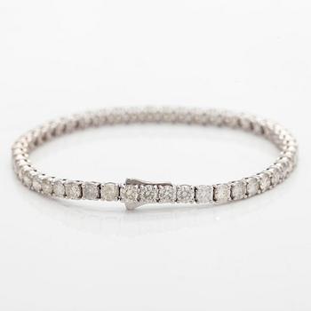 Tennis bracelet, brilliant cut diamonds, 14K white gold.