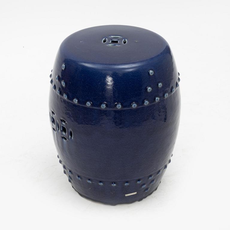 A barrel shaped Chinese blue glazed garden seat, 20th century.