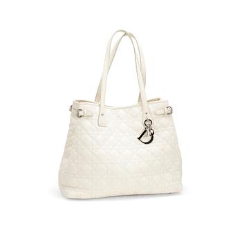 CHRISTIAN DIOR, a frosted white canvas "Dior Panarea" shopping bag.