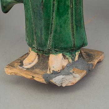 A group of eight chinese figures with three objects, earthenware, Ming dynasty.