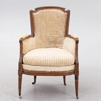 A French armchair, Directoire, early 19th century.