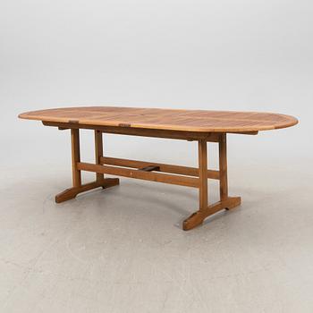 A 9 pcs stained teak garden suite by Brafab around 2000.