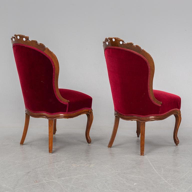 A pair of mahogany Neo-Rococo easy chairs, late 19th Century.