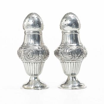 A pair of German silver sugar shakers, around 1900. Weight c. 302 grams.