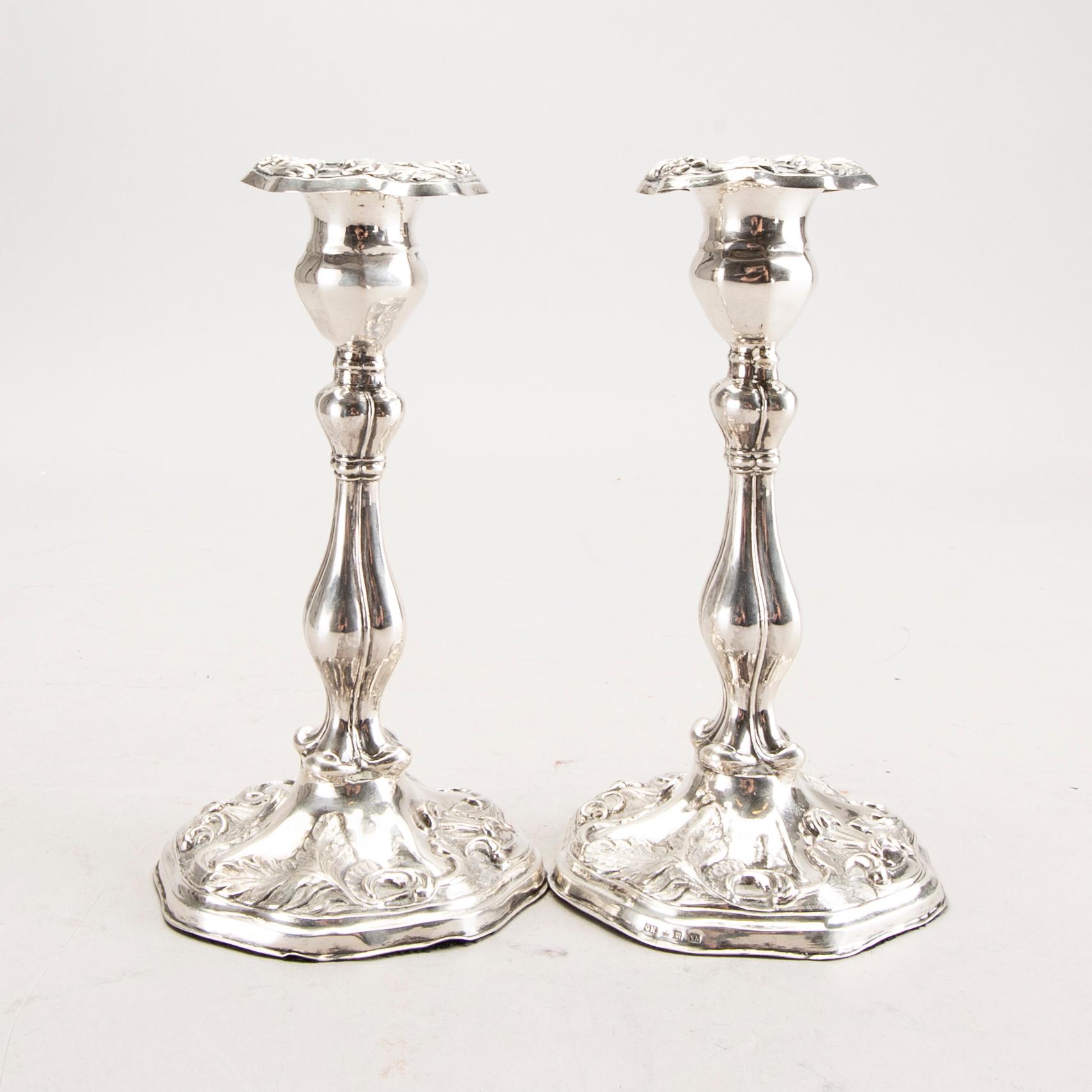 A 19th century pair of silver candle sticks mark of Oskar Närman Mariestad 1877.