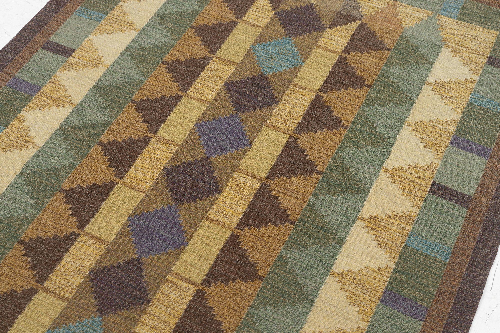 Inga-Mi Varneus Rydgren, a carpet, flat weave, c. 246 x 169 cm, signed IV.
