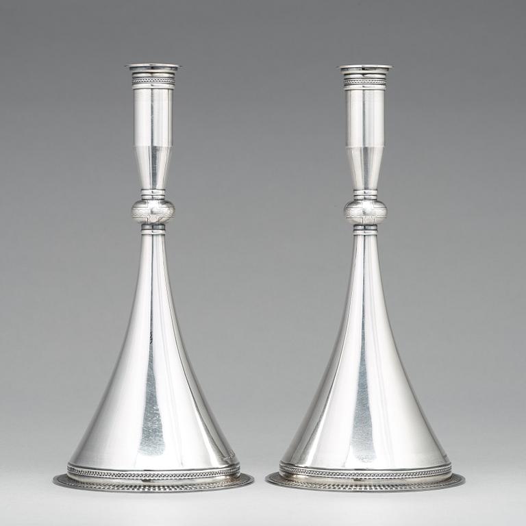 Wiwen Nilsson, a pair of sterling candlesticks, Lund 1948.