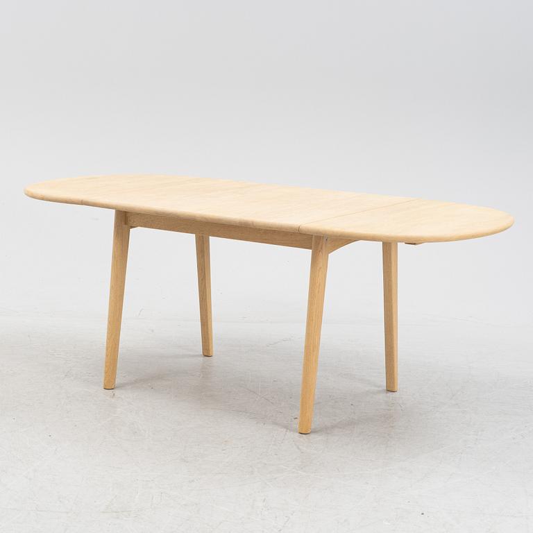 Hans J Wegner, an oak dining table model 'CH002' Carl Hansen & Søn, Denmark.