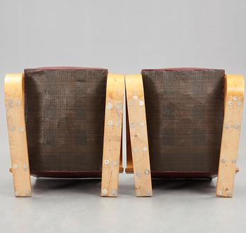 Alvar Aalto, A pair of Alvar Aalto tank easy chairs, model 400 probably by Huoneakalu-ja Rakennustyötehdas Oy, Finland, for Artek,