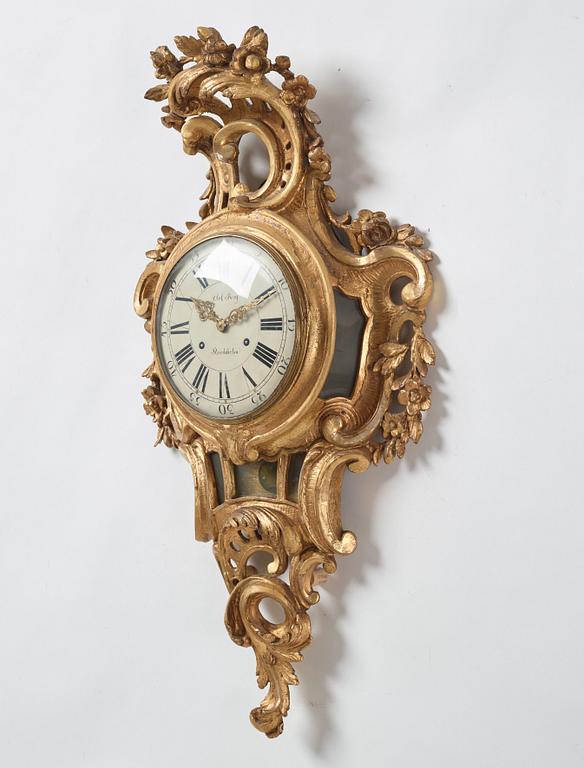 A Swedish rococo wall clock by Olof Berg, second half of the 18th century.