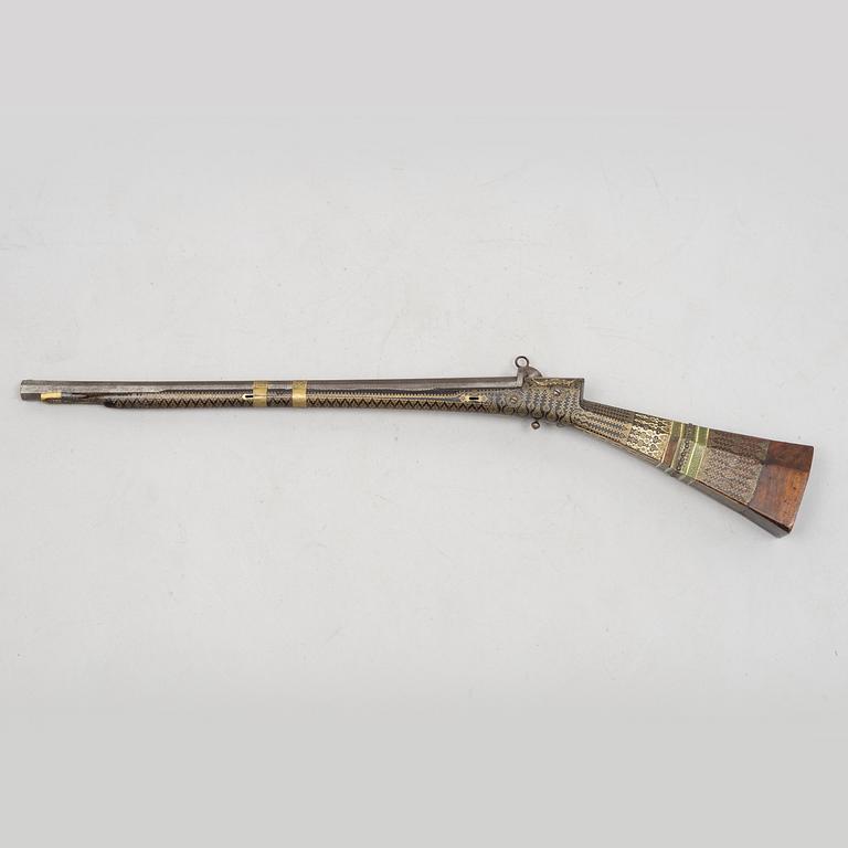 A Persian snaphaunce rifle, 18th century.