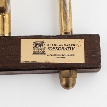 Klädhängare, "Dekorativ", Skogslunds metallgjuteri, Anderstorp, 1950/60-tal.