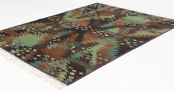 Barbro Nilsson, a carpet, flat weave, "Tånga brun och grön", ca 273 x 211 cm, signed AB MMF BN.