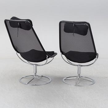 A pair of "Jetson" easy chairs by Bruno Mathsson for Bruno Mathsson International, Värnamo, 2010.