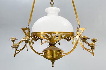 A Jugend brass celing paraffin lamp.