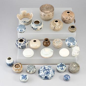 A group of 24 Southeast asian ceramic jars and boxes, 18-19th century.