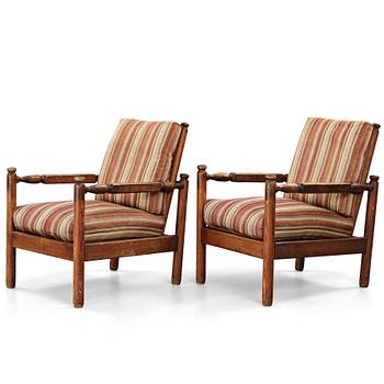 250. Axel Einar Hjorth, a pair of stained pine "Sandhamn" lounge chairs, Nordiska Kompaniet, Sweden 1929.